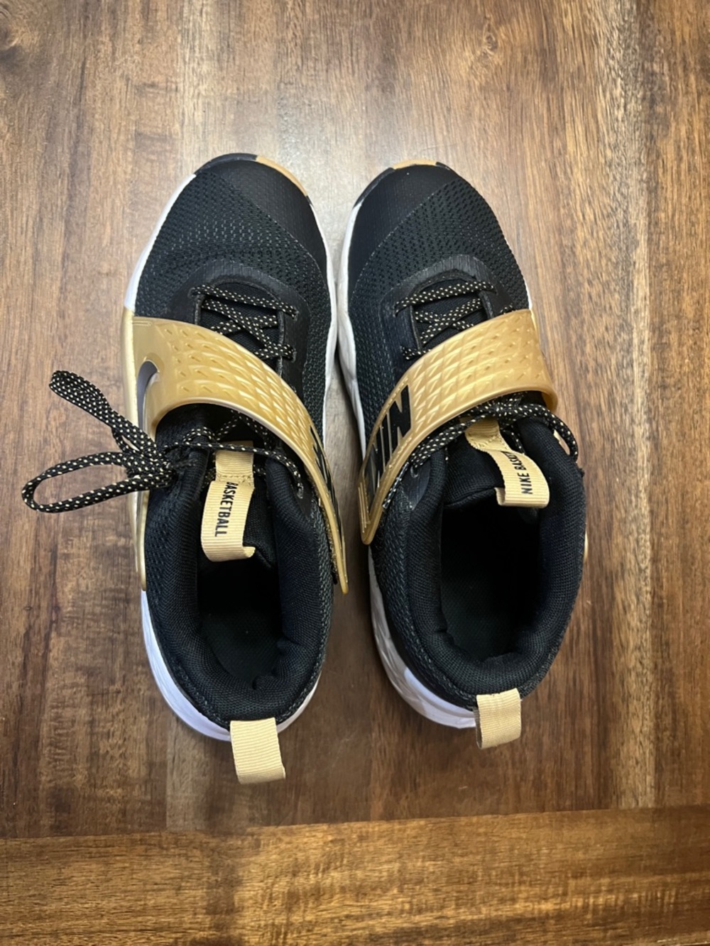 Nike Kids Black and Gold Strap Athletic Sneakers